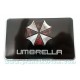 Sticker umbrella corporation logo rectangle fond noir badge 3d m&eacute;tal used